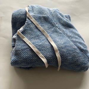 Light weight blue sweater with lace hood and pocket